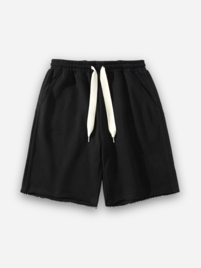 Black shorts with a drawstring on a white background