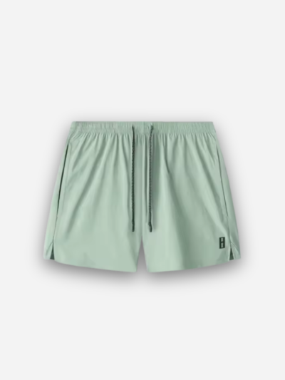 Pheuw® Aero-Woven Quarter Shorts in light green, front view